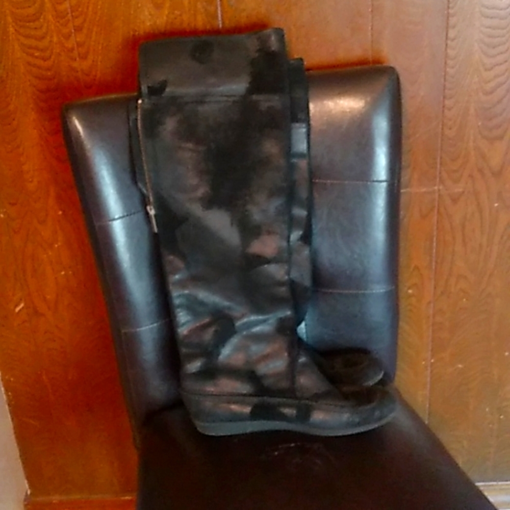 Black leather knee high boots